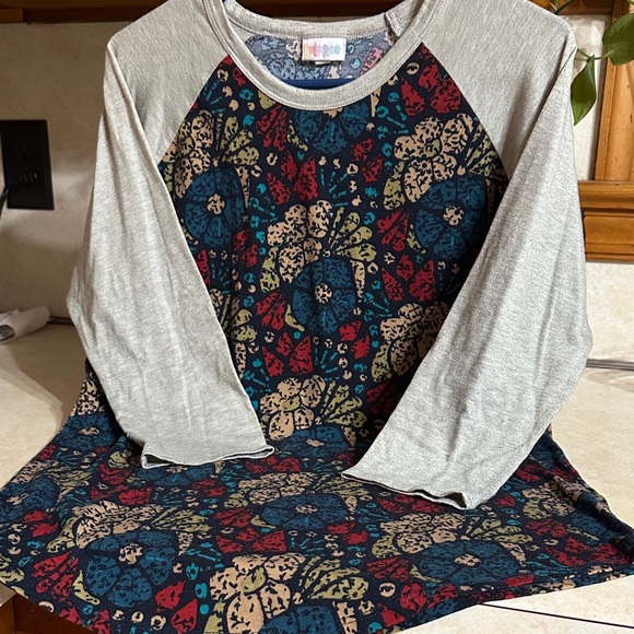 LuLaRoe Multicolor Floral Top with Gray Sleeves P2P 21” to 24” and Length 27” - Picture 6 of 6